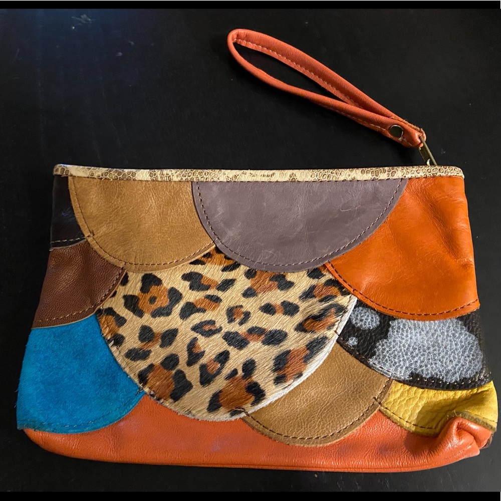 Small clutch with wrist band